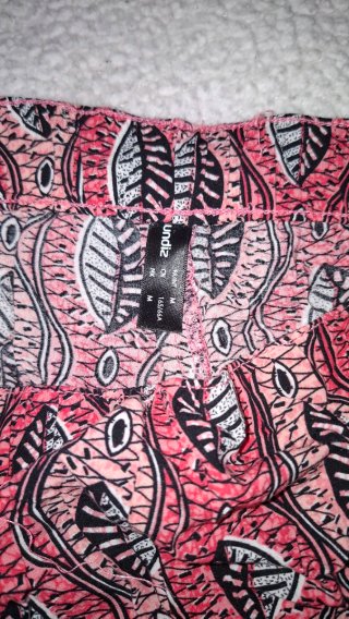 Pantalones anchos estampado floral rosa
