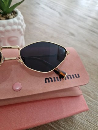 Occhiali da sole Miu Miu oro e nero