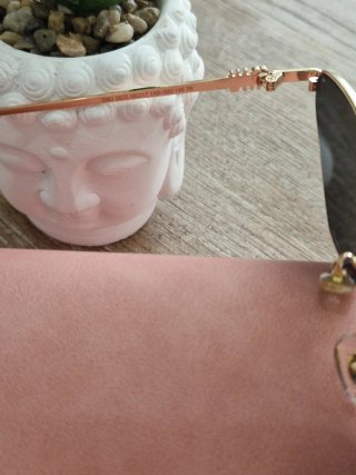 Occhiali da sole Miu Miu oro e nero