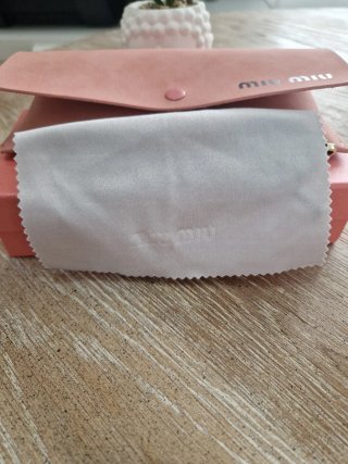 Occhiali da sole Miu Miu oro e nero