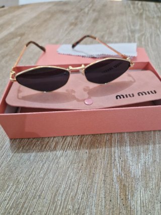 Occhiali da sole Miu Miu oro e nero