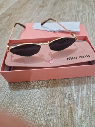 Occhiali da sole Miu Miu oro e nero