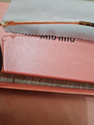 Occhiali da sole Miu Miu oro e nero