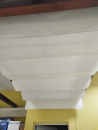 Pérgola de madera con estores