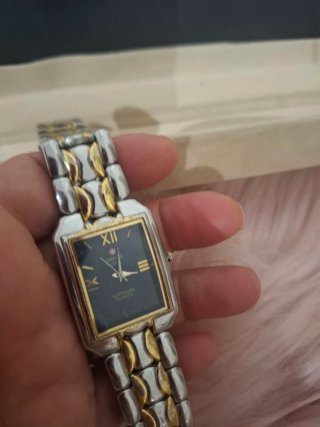 Reloj Suizo Dorado y Plateado