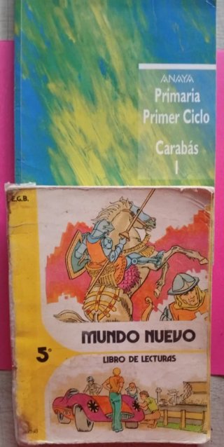 2 libros lectura egb,mundo nuevo 5 y carabas 1