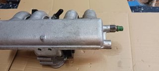 Colector y cuerpo mariposa RS Turbo 1988