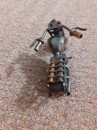 Moto decorativa de metal