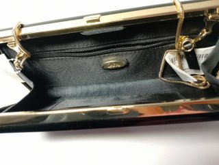 Bolso fiesta Zara negro y dorado