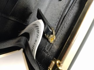Bolso fiesta Zara negro y dorado