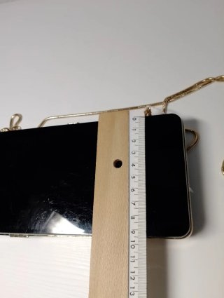 Bolso fiesta Zara negro y dorado