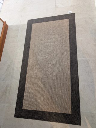 Alfombra vinilica de tejido trenzad beige y marrón