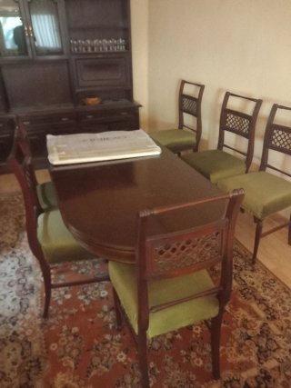 Mesa de comedor ovalada con 6 sillas