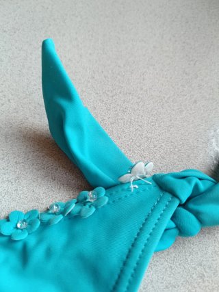 Slip costume turchese con fiori