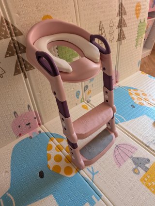 Asiento reductor para bebé con escalón