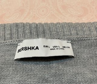 Jersey Bershka hombro descubierto talla L
