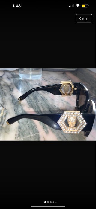 Gafas de sol Philipp Plein negras y doradas