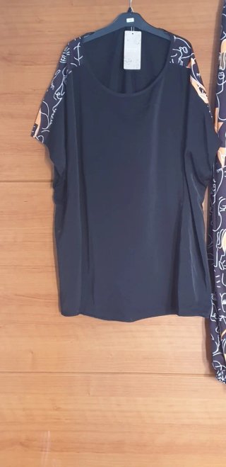 Conjunto mujer negro y naranja