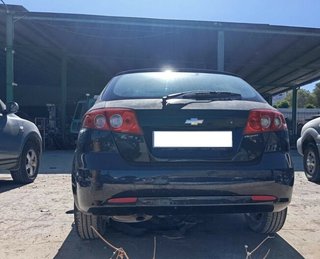 Faro izquierdo chevrolet lacetti cdx 466421