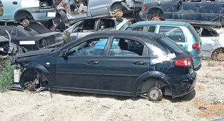 Faro izquierdo chevrolet lacetti cdx 466421