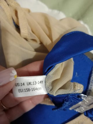 Maillot patinaje artístico beige y azul