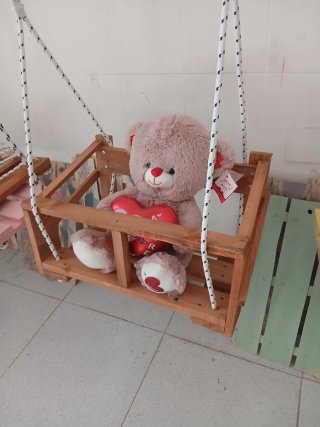 Altalena in legno per bambini