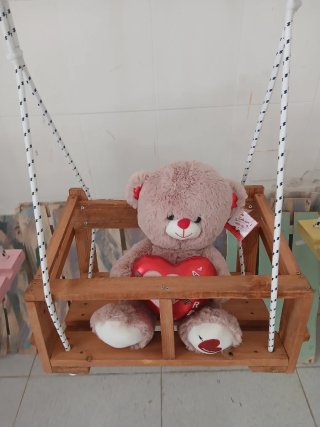 Altalena in legno per bambini
