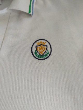 Polo blanco uniforme Pureza de María