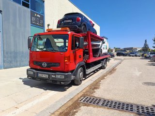 Servicio de grúa porta coches caravanas.