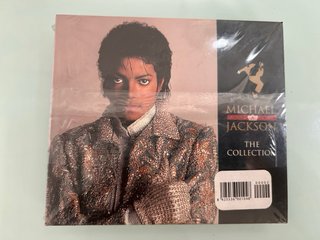 PRECINTADO!! CD THRILLER + LIBRO-MICHAEL JACKSON