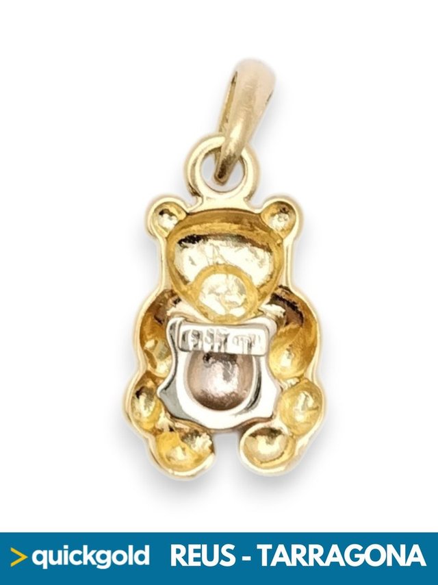 035-03-00667 COLGANTE ORO DE 18K OSO 2.19GR.