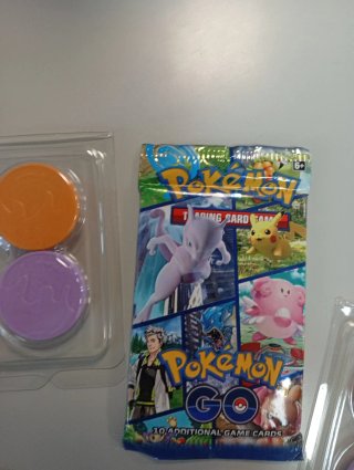 Cartas Pokémon GO - Paquetes y Monedas