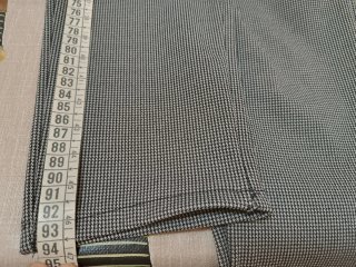 Pantalón pitillo blanco y negro