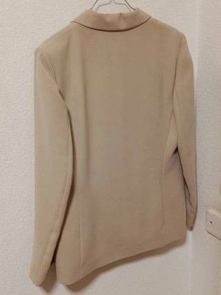 Traje chaqueta y pantalón beige Talla 42