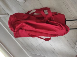 Bolsa de viaje con ruedas roja