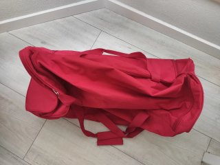 Bolsa de viaje con ruedas roja