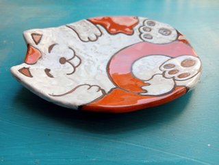 Supporto per cucchiai a forma di gatto in ceramica arancione e bianco