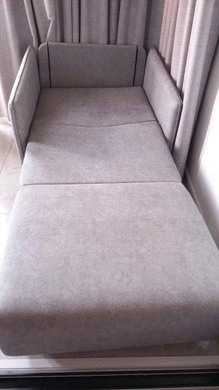 Sillón cama extensible gris , la cama es de 80×1,9