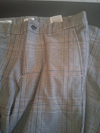 Pantalones de cuadros grises y marrones