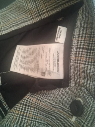 Pantalones de cuadros grises y marrones