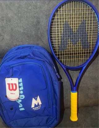 Raqueta y mochila Wilson azul