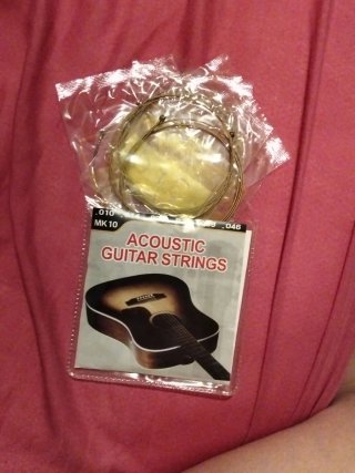 Guitarra, amplificador, 5 cuerdas y afinador digit