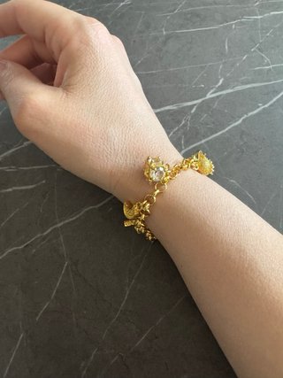 Bracciale placcato oro con ciondoli