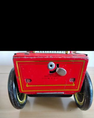 Coche antiguo de hojalata con luz y sonido