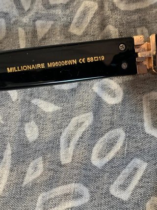 Occhiali da sole Louis Vuitton neri e oro