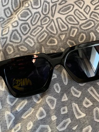 Occhiali da sole Louis Vuitton neri e oro