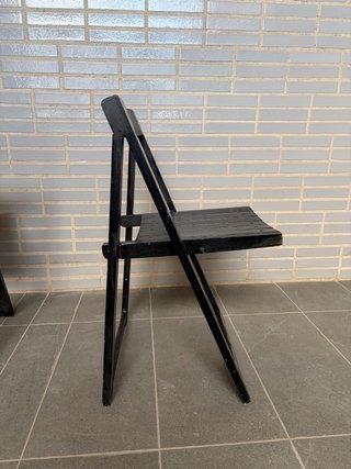 Sillas plegables de madera negras