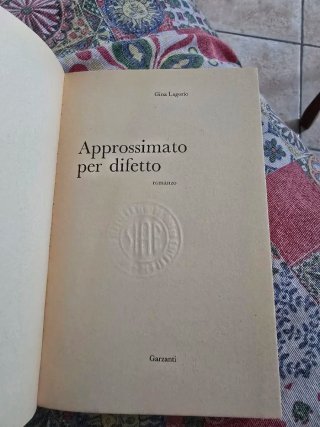 Approssimato per difetto