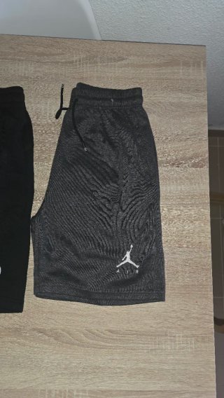 Conjunto 2 Pantalones Jordan y TNF Talla M