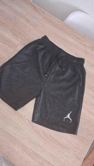 Conjunto 2 Pantalones Jordan y TNF Talla M